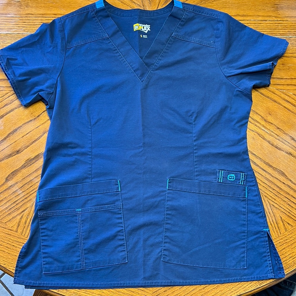 Wonder flex blue scrub top. Size small.